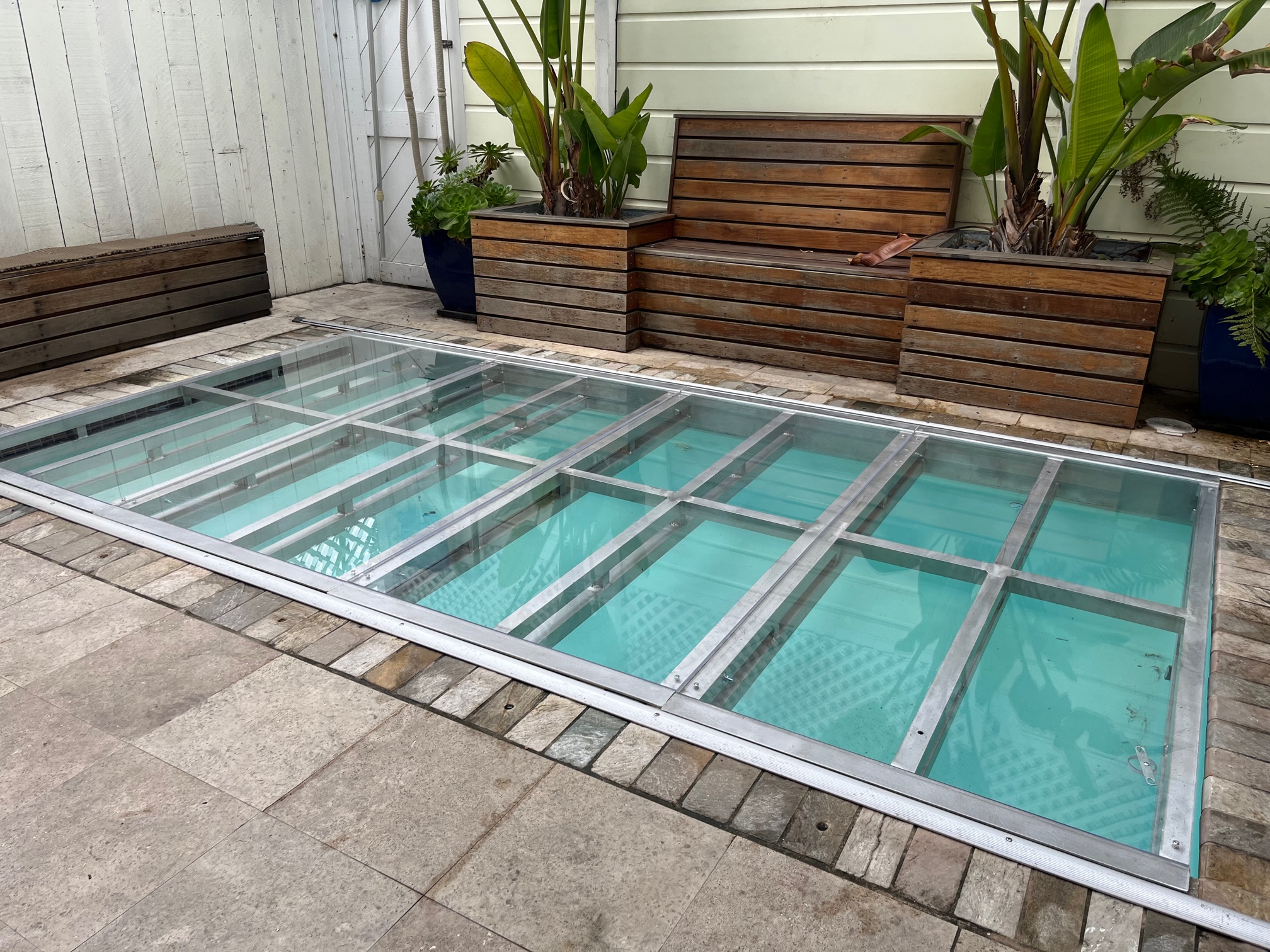 Semipermanent aluminum frame custom made hard surface pool covers