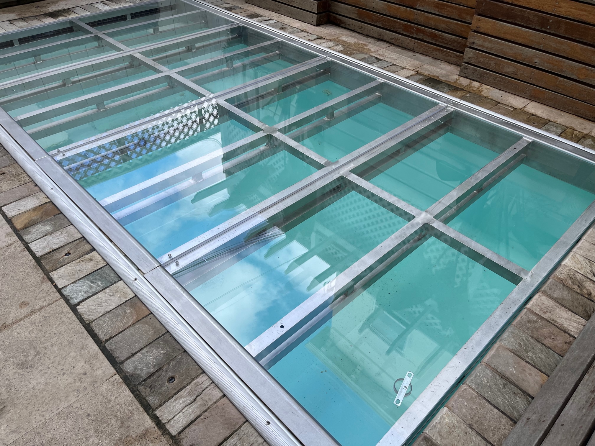 Semipermanent aluminum frame custom made hard surface pool covers