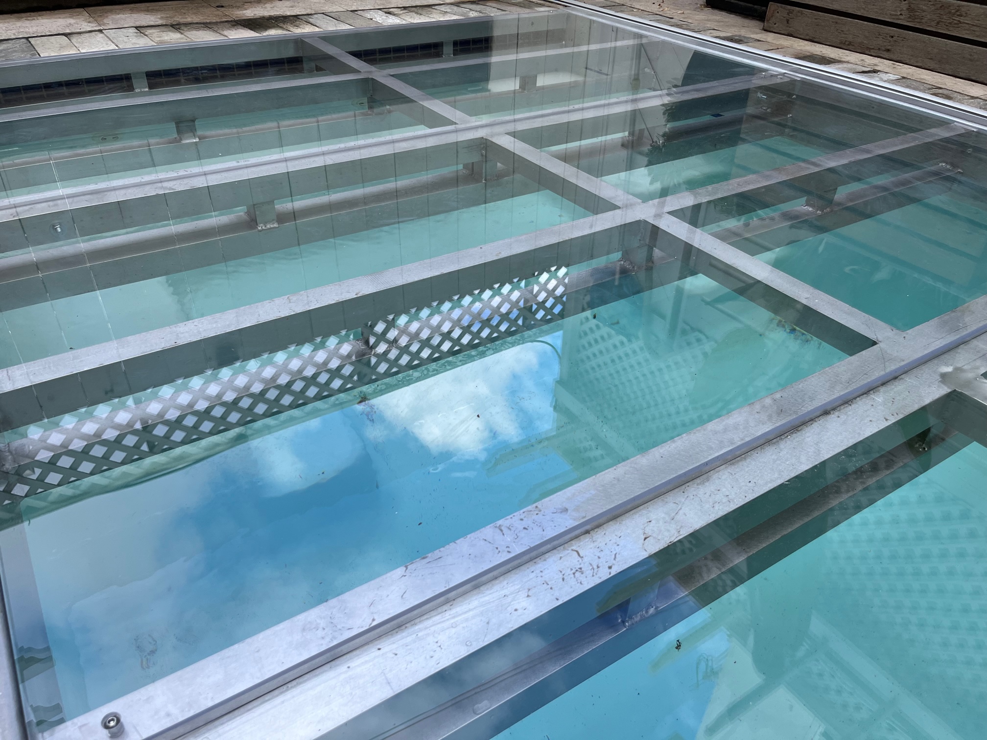 Semipermanent aluminum frame custom made hard surface pool covers